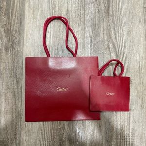 2 Cartier shopping bags